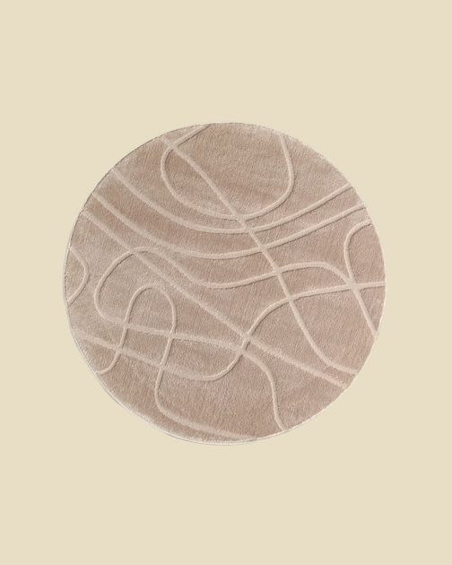 Tapis rond en laine Micadoni Tana en rose poudré, motif tourbillonnant