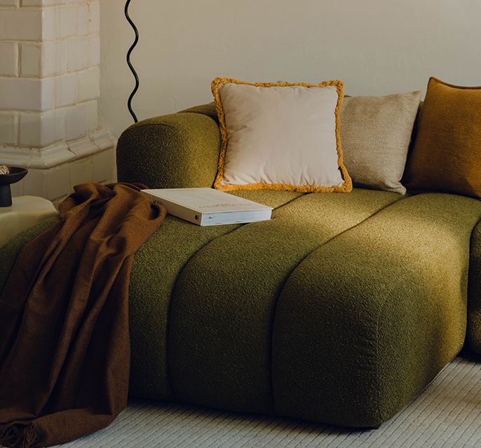 Micadoni Neo 2-seater sofa in grey bouclé, boxy design, styled living room