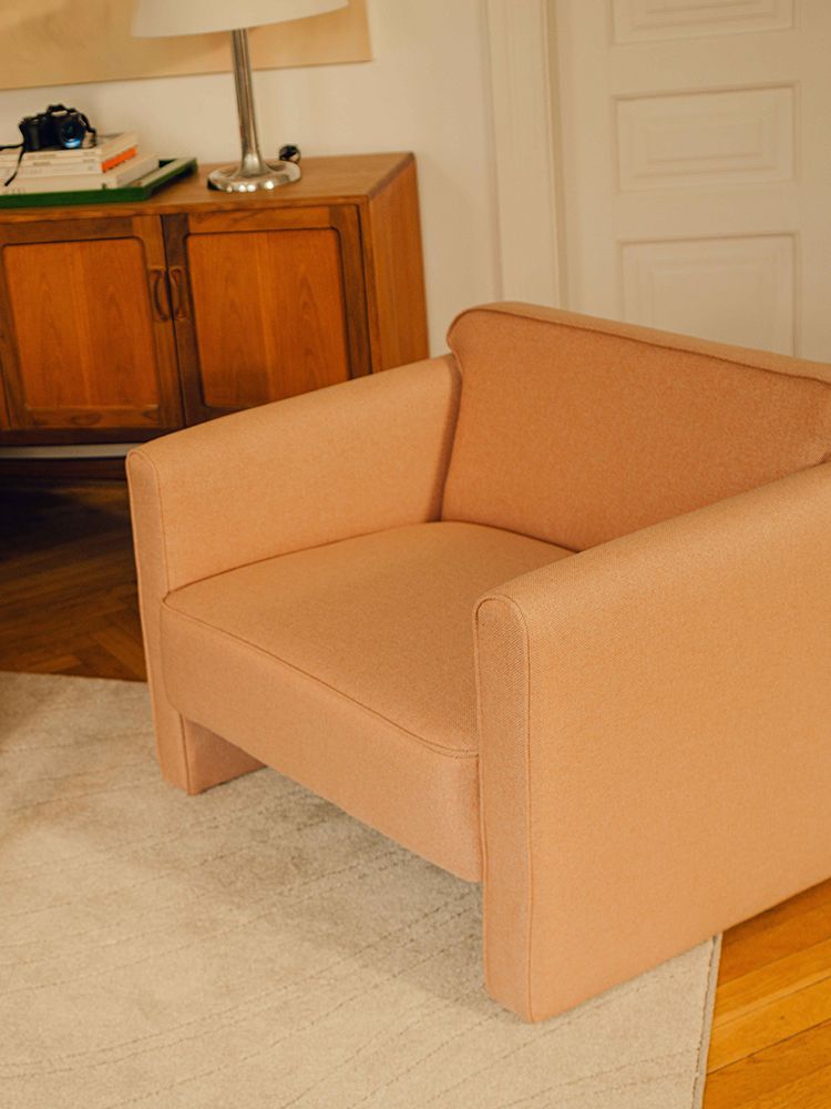 Micadoni Abby armchair in peach weave, boxy design, styled living room