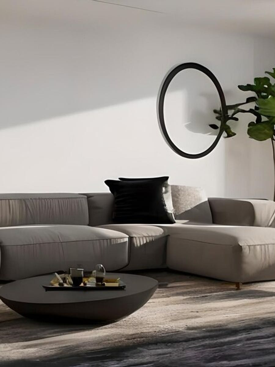 Surowy wygląd salonu w stylu industrialnym ociepli welwetowa sofa