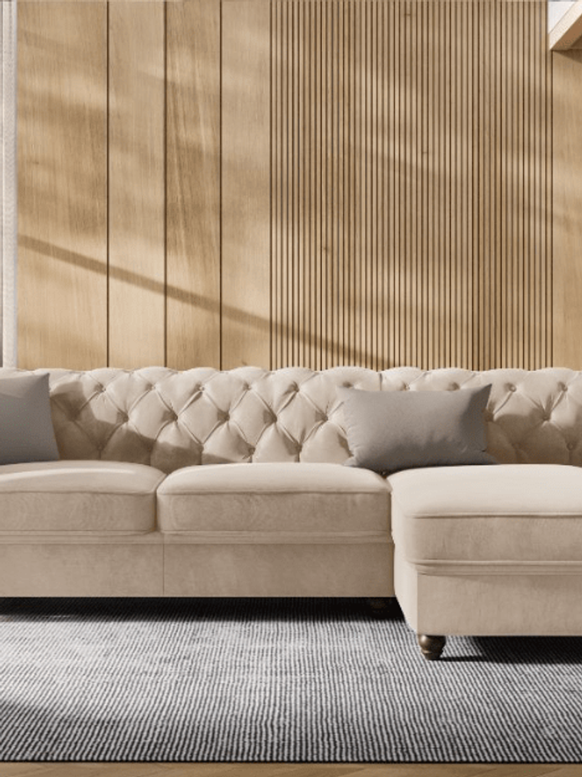 Sofa chesterfield z pikowaniem pasuje do współczesnego salonu w stylu romantycznym