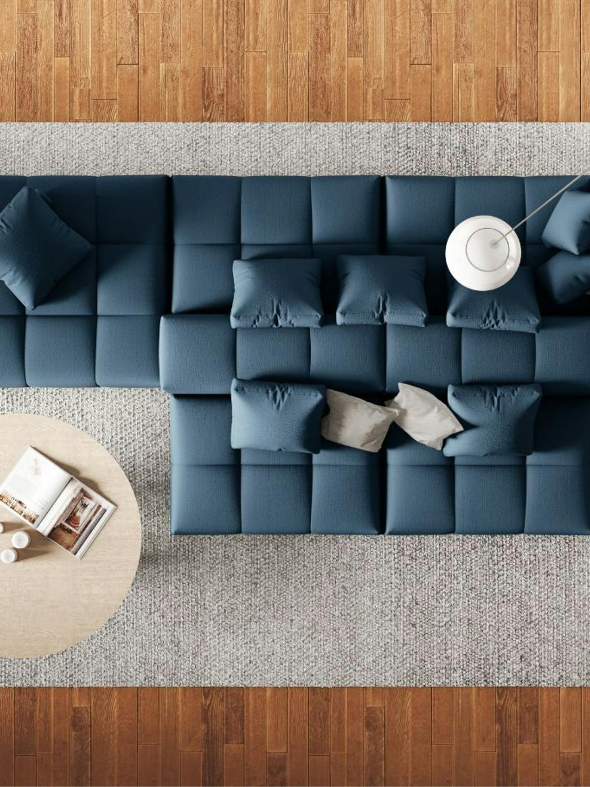 blue-modular-sofa-on-wooden-tiling