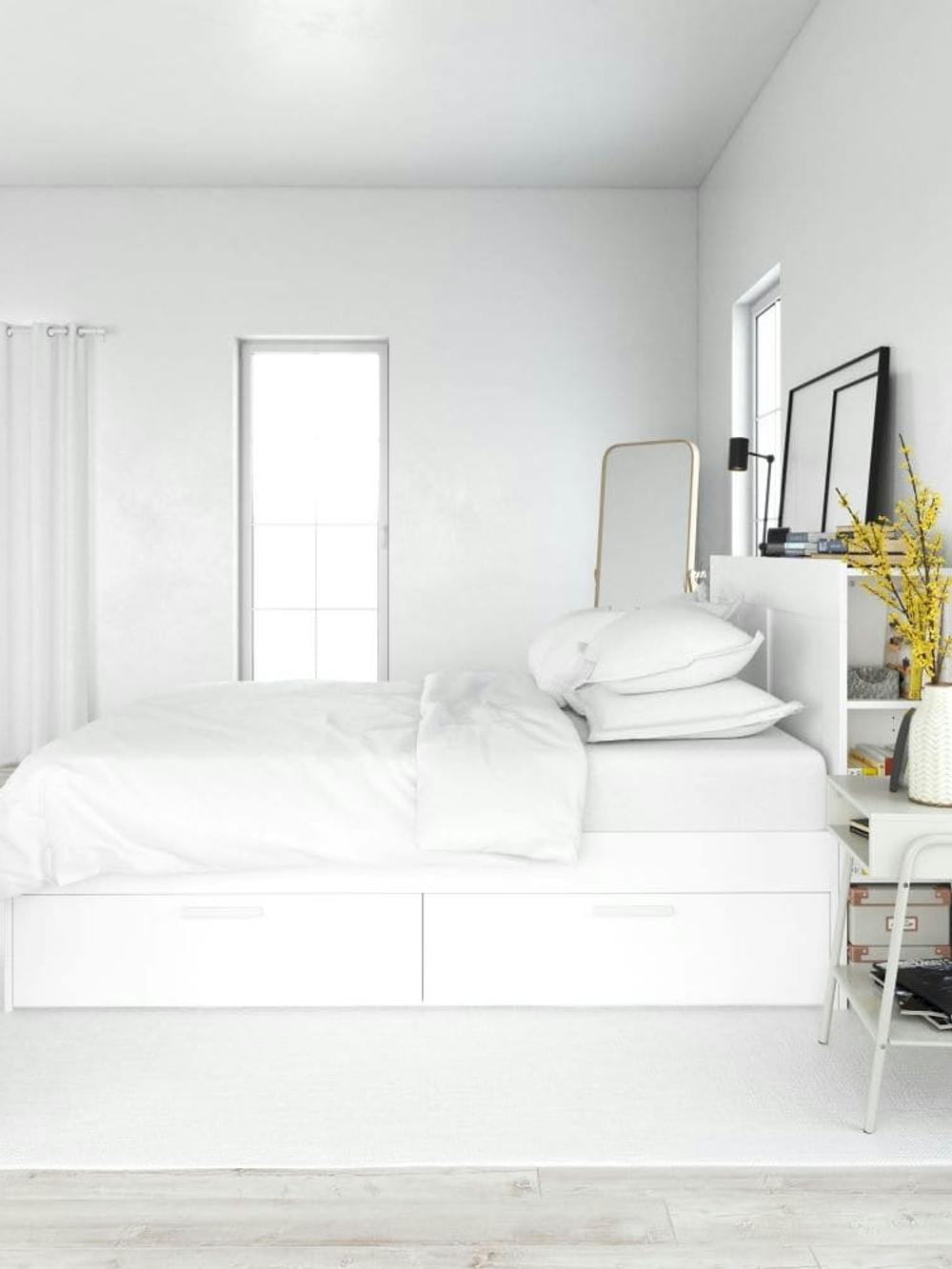 Funkcjonalna jasna sypialnia minimalistyczna z dużym łóżkiem